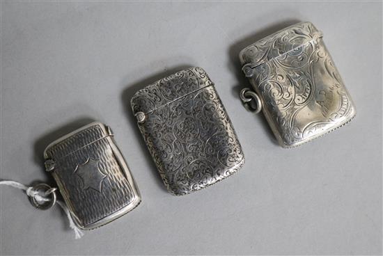 Three assorted silver vesta cases.